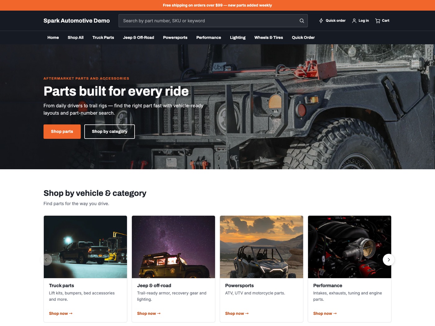 Spark Automotive Theme homepage on the demo store: a dark hero with a 4x4 truck above a row of parts-category cards.